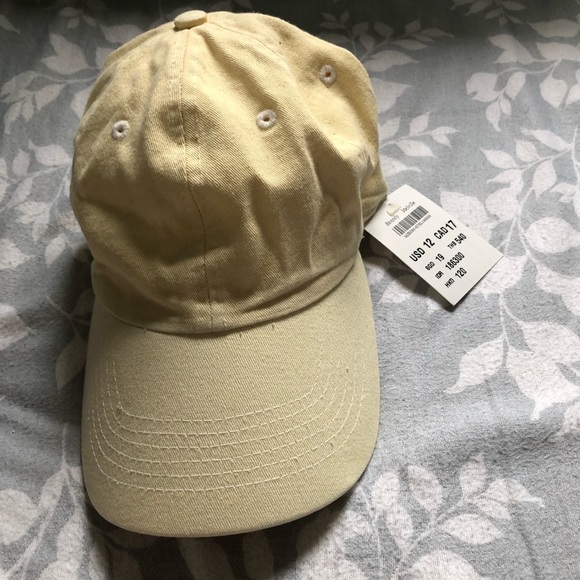 pale yellow baseball cap